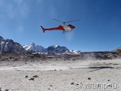 Helicopter landing on the beach